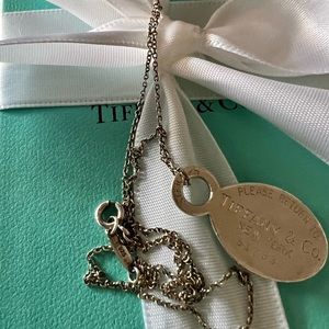 Tiffany&co “please return to Tiffany” tag with 16 inch chain.